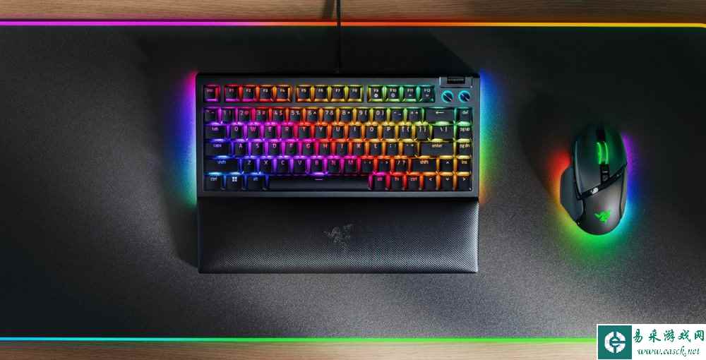 A rainbow colored keyboard on a mouse pad

Description automatically generated