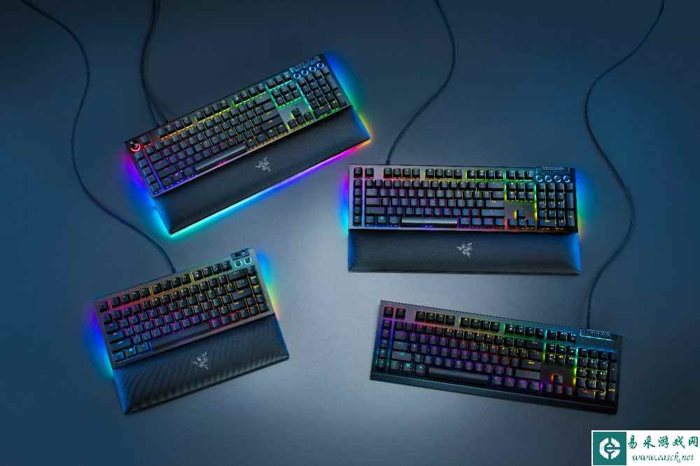 A group of keyboards with colorful lights

Description automatically generated