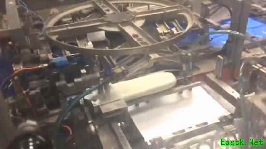 PS4游戏光盘全自动封装过程震撼曝光，展现精密工业美学